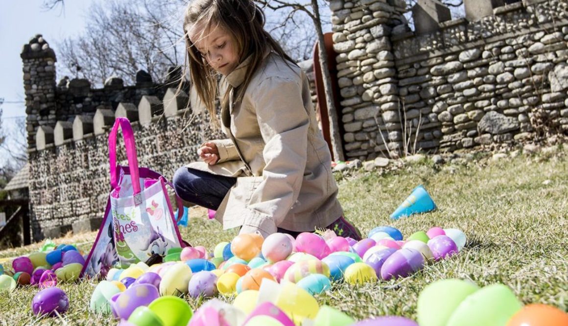 Girl at castle with easter eggs